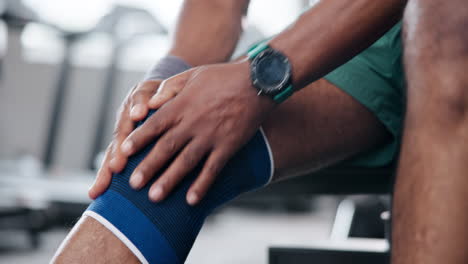 a man with a knee injury at the gym