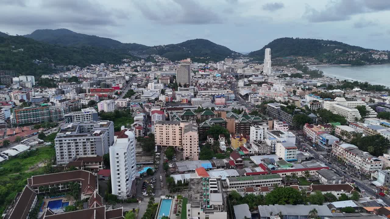 Drone aerial birds eye view patong walking street bangla road phuket town thailand coast city beach