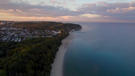 aerial view along tranquil beach by the baltic sea in orlowo during sunset