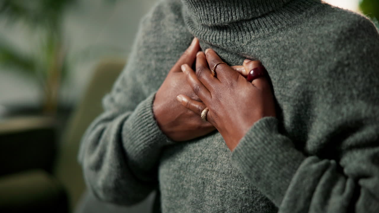 Woman experiencing chest pain