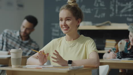 students engaging in a classroom discussion or lecture