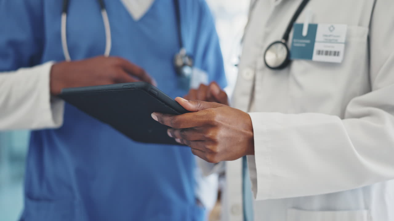 Planning, tablet and a doctor in discussion