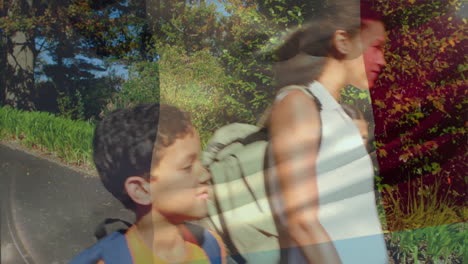 animación de la bandera de francia sobre madre biracial e hijos caminando en el parque