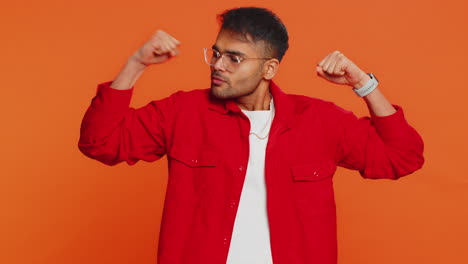 man looking confident showing biceps feeling power strength to fight for rights success win