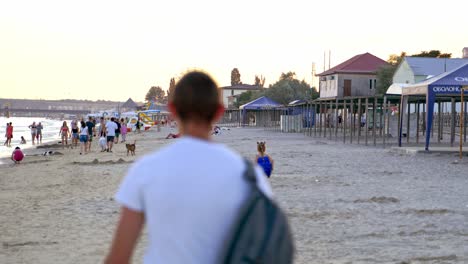 girl running on sand at beach. girl playing on the beach on summer holidays