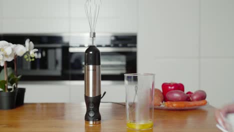 powerful electric whisk mixing ingredients for cake batter