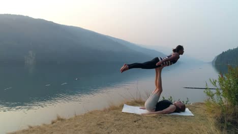 couple practice acroyoga 4k