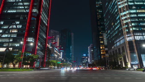 Seoul-Yeouido-Night-Traffic-Timelapse-by-Business-and-Finance-Modern-Office-Buildings,-Architecture-in-Yeouido-Financial-District,-South-Korea---hyperlapse-zoom-out