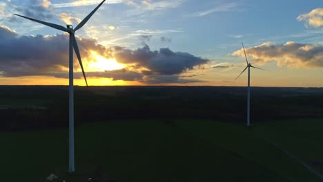 wind turbines at sunset