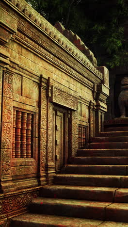 ancient stone temple with carved details and steps