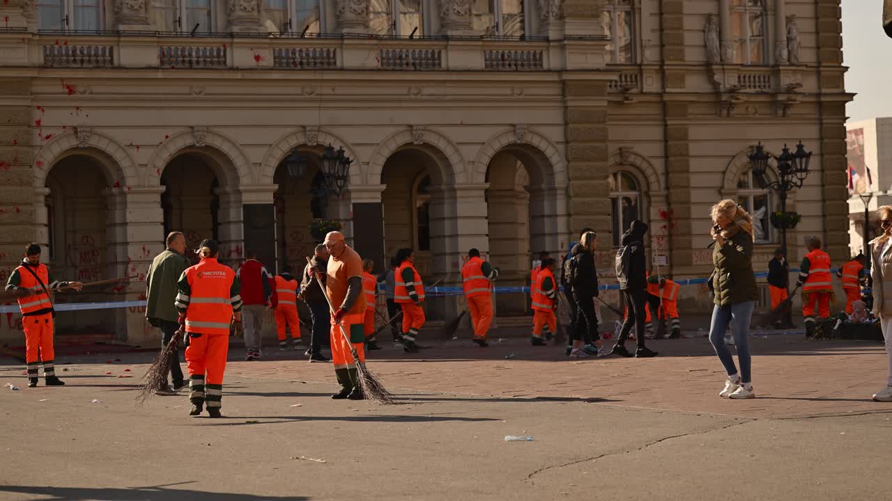 City Workers Cleaning Up Graffiti and Damage After a Protest