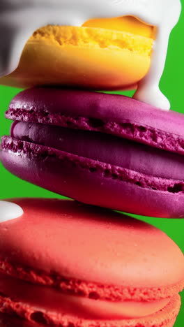 colorful macarons with drizzled milk