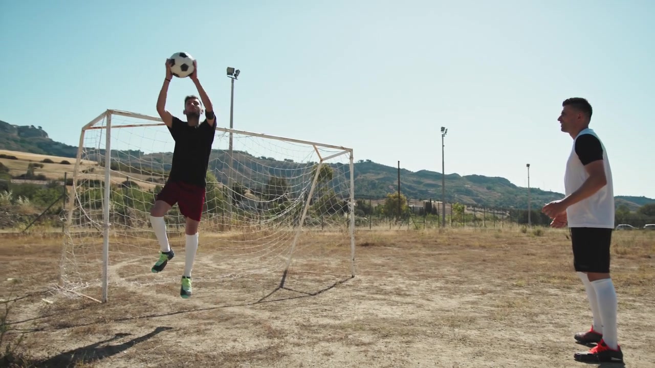 Goalkeeper Practicing The High Catch