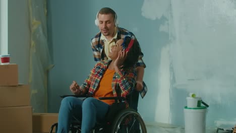 a white man is wheeling an african american woman (2).mov | adult, african, american, apartment