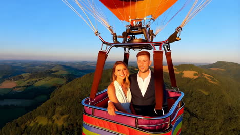 a couple enjoys a romantic hot air balloon ride over a stunning landscape