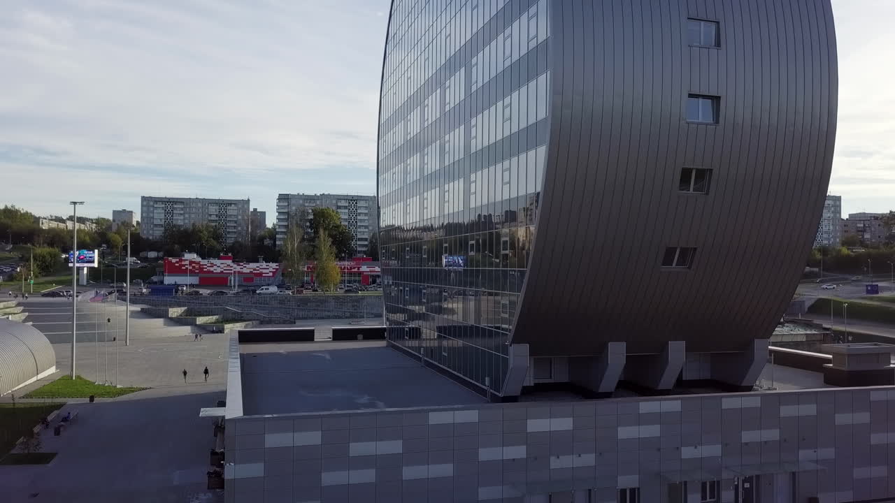 Modern Circular Building in a Cityscape