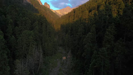 Aerial-ascending-shot-inside-the-Nexpayantla-Ravine,-sunny-evening-in-Popocatepetl-volcano