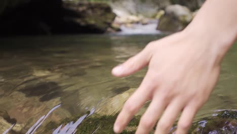 a hand navigates the stream.