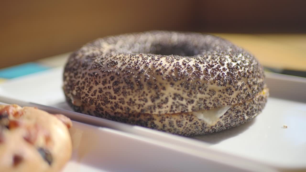 Close Up of a Poppy Seed Bagel with Cream Cheese