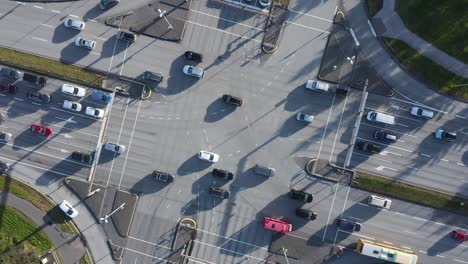 busy traffic at kringlumýrarbraut and miklabraut intersection in iceland, aerial