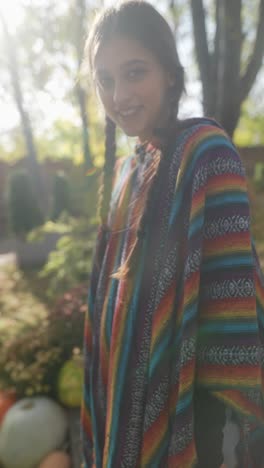 woman wearing a colorful striped poncho