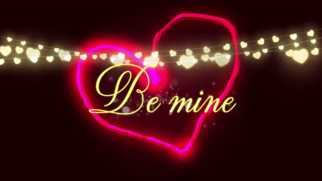 be mine written inside pink glowing heart with heart shaped string lights glowing on black backgroun