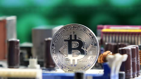 Bitcoin Coin on Circuit Board