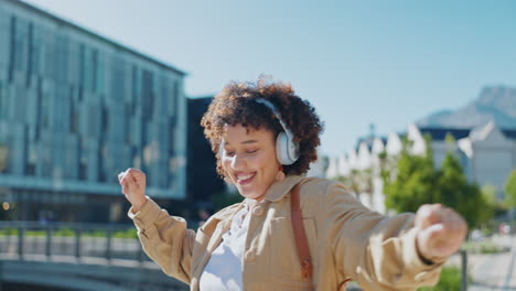 Headphones,-dancing-and-woman-in-city-for-5g-music