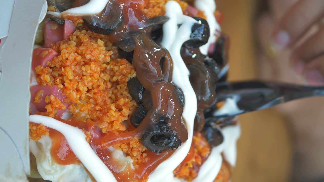 Close-up of Kumpir with Various Toppings