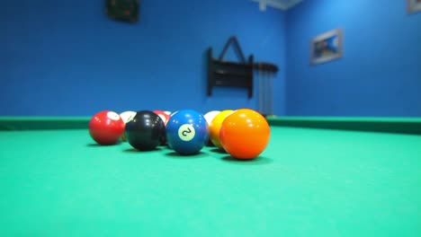 colorful billiard balls on pool table. game process. billiards game starting