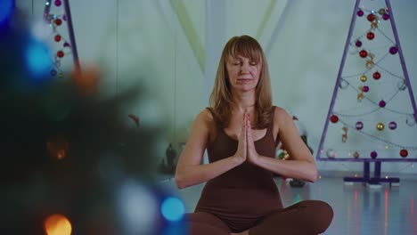 woman meditating during christmas season