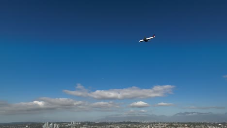 Airplane-Flying-Over-The-City-From-Vancouver-International-Airport-In-Sea-Island,-Richmond,-British-Columbia,-Canada