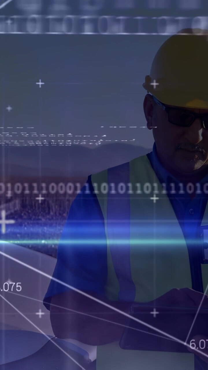 Vertical video: Digital HUD coming on, tech tapping tablet, checking turbine data for safety