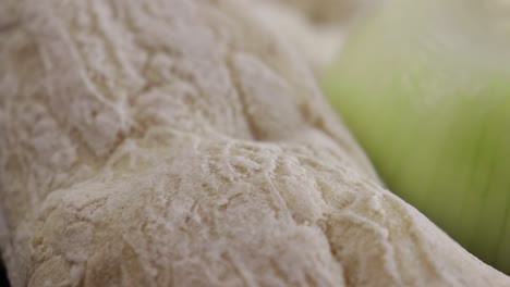 whip pan into close up of mini ciabatta loaf