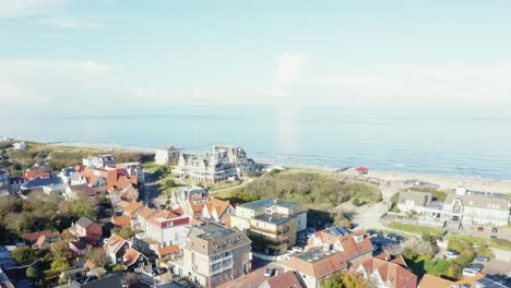 Aerial-shot-of-a-beach-in-zeeland,-the-netherlands-in-4k