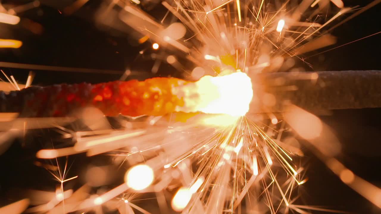 Sparkler buring in slow motion closer up.