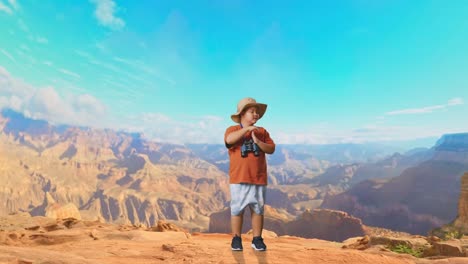 asian boy with a hat and binoculars shaking head showing time out gesture while traveling at the top of mountain. boy researcher, travel tourism adventure concept, full body