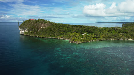 Aerial-push-in-towards-Chapelle-Notre-Dame-de-Lourdes-on-island-of-Lifou