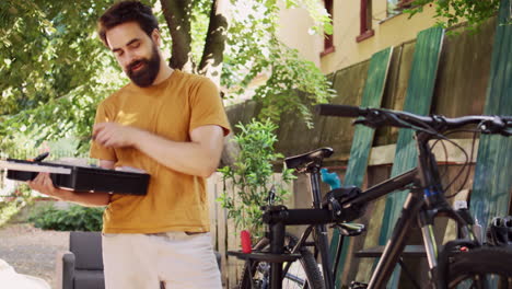 man selecting different bicycle tools