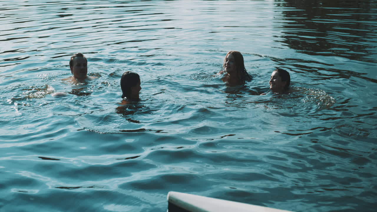 Friends Swimming in a Lake