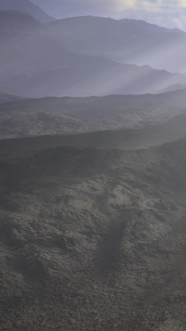 Mountain landscape with fog and shadows during early morning hours