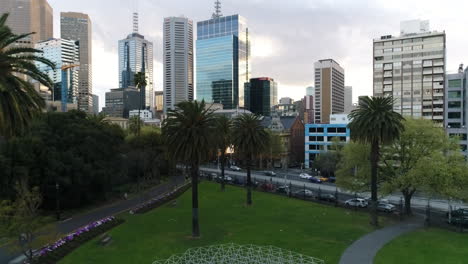 Aerial-view-of-Melbourne-CBD-at-sunset-parliament-building-and-princess-theatre-visible