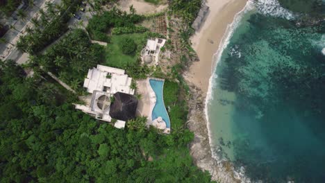 Bird-eye-aerial-of-landscape-along-the-mesmerizing-coastline-in-Huatulco,-Mexico