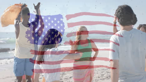 animación de la bandera de los ee.uu. sobre amigos diversos felices en la playa en verano