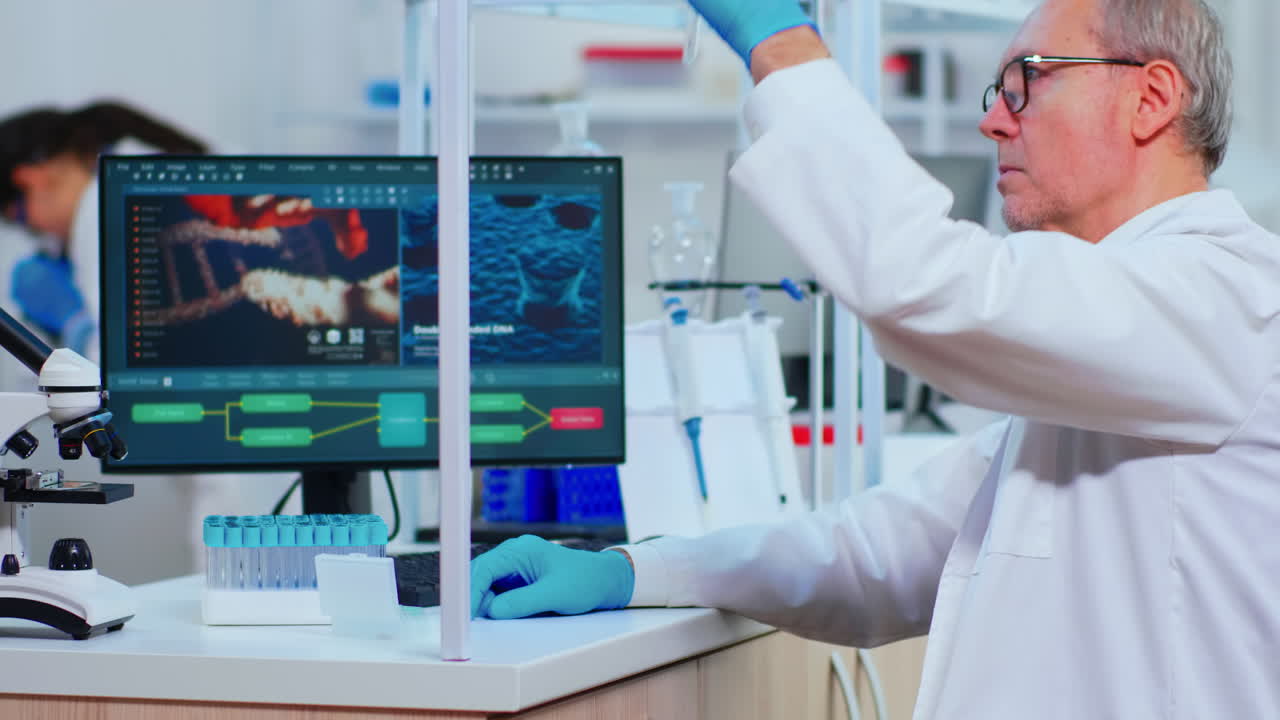 Senior man chemist examinining drug discovery using test tube