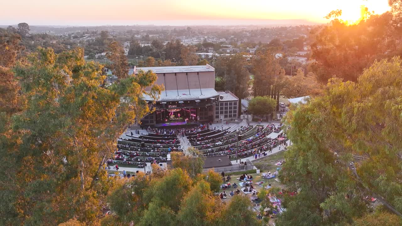 Aerial view of the Moonlight Amphitheater filled with people during sunset