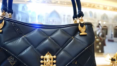 black quilted leather handbag with gold hardware