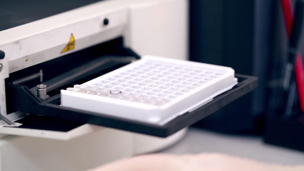 Automated machine in the laboratory. Modern apparatus in pharmacology. Special device for diagnostic research of samples.