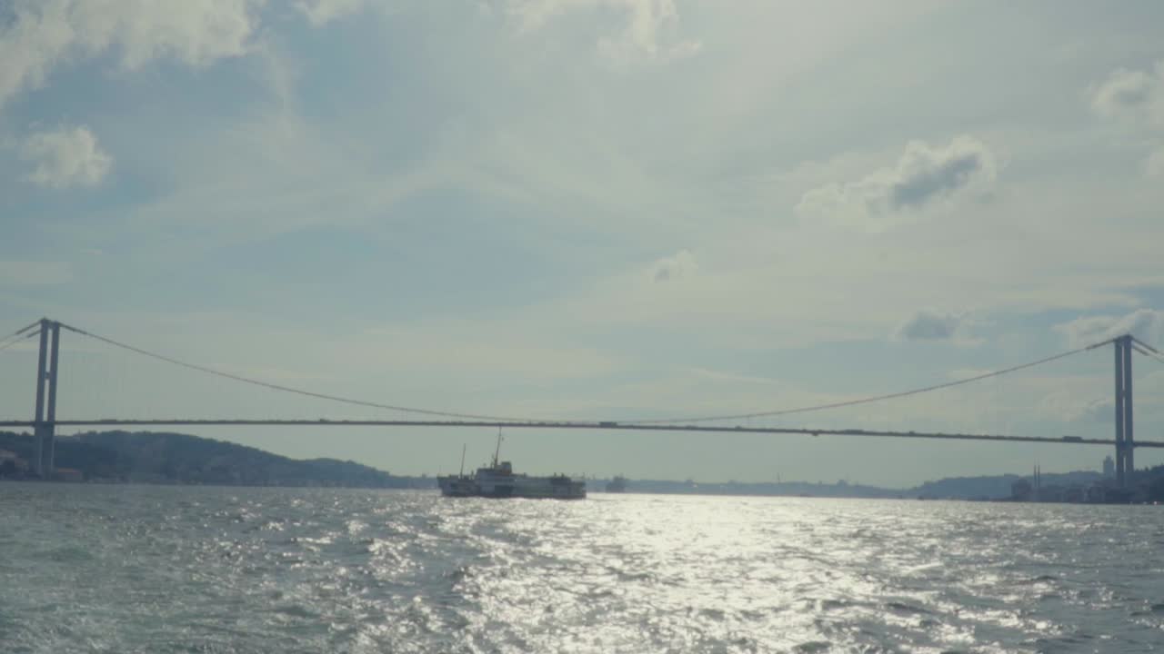BOSPHORUS BRIDGE AND FERRY, FATIH SULTAN MEHMET BRIDGE, ASIA CONTINENT, EUROPE CONTINENT