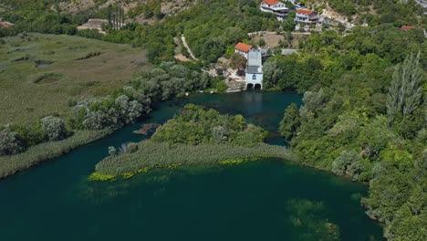 vegetated lakeshore near coastal villages in krka national park, southern croatia